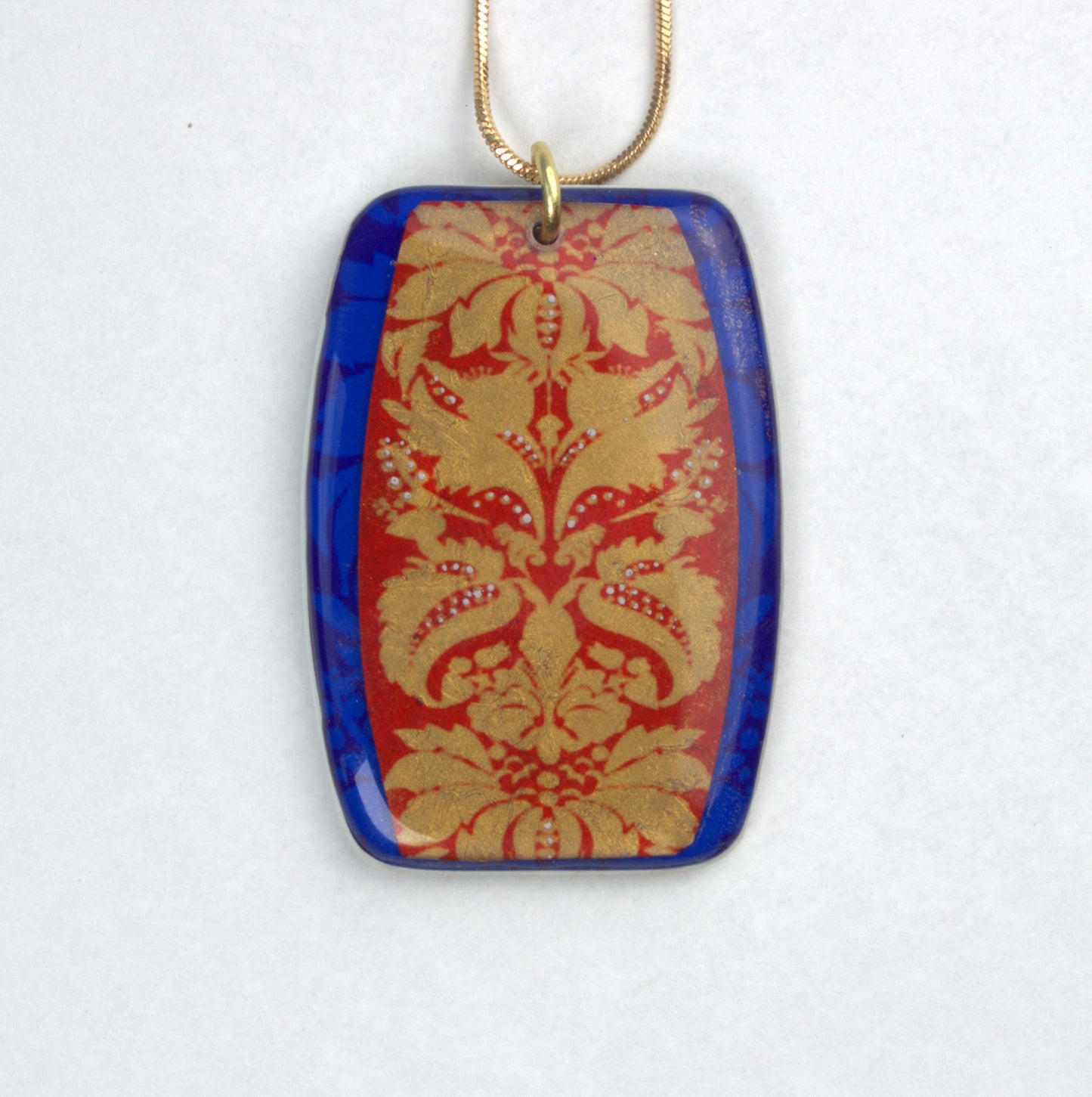 Red and White on Blue and Gold Pendant Necklace